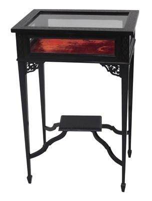 Lot 1211 - An Edwardian ebonised mahogany display...