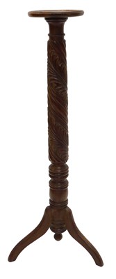 Lot 1225 - A 20thC mahogany torchere, with a circular...