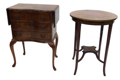 Lot 1226 - A walnut side cabinet, the shaped top with two...