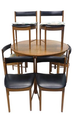 Lot 1228 - A Danish style teak extending dining table,...