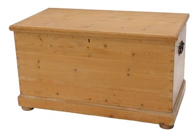 Lot 1233 - A stripped pine blanket box, the hinged lid...