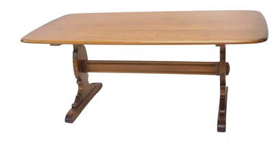Lot 1236 - An Ercol elm rectangular coffee table, on...
