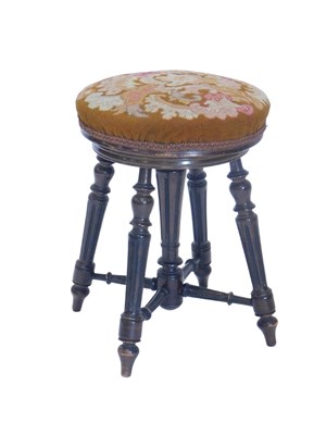 Lot 1254 - A 19thC walnut adjustable piano stool, with a...