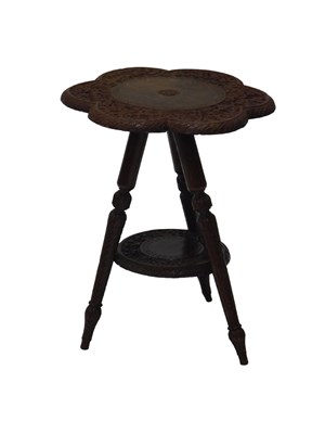 Lot 1269 - An Indian carved hardwood occasional...