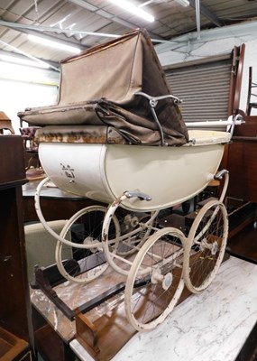 Lot 1721 - A child's Silver Cross pram, in ivory...
