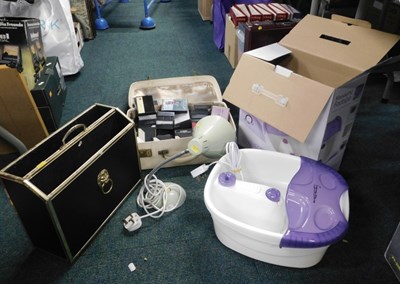 Lot 2083 - A massaging foot spa, brass magazine rack and...
