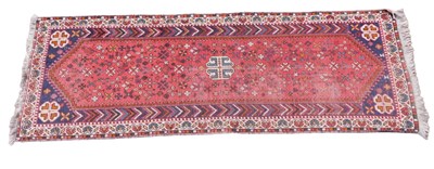 Lot 1295 - A Persian runner, with a geometric design in...