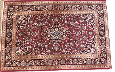 Lot 1296 - A Persian Keshan rug, with a design of flowers,...