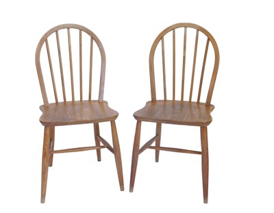 Lot 1220 - A pair of Ercol pale coloured ash and elm...