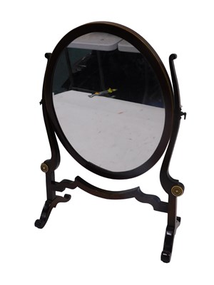 Lot 1064 - A mahogany dressing table mirror, with oval...
