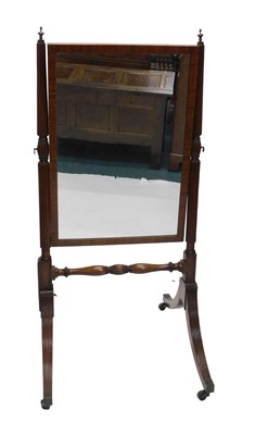 Lot 1275 - A Regency mahogany cheval mirror, the...