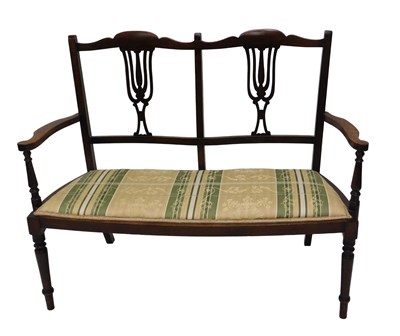 Lot 1277 - An Edwardian mahogany chair back sofa, with a...