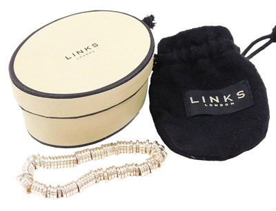 Lot 428 - A Links of London sweetie bracelet, white...