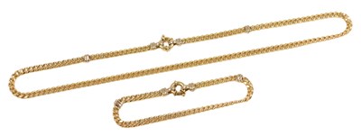 Lot 514 - A curb link neckchain and bracelet, each on a...