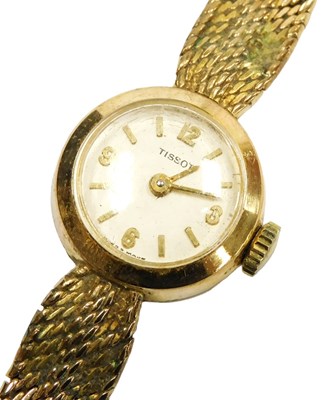 Lot 423 - A Tissot lady's 9ct gold cased...