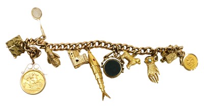 Lot 4 - A 9ct gold charm bracelet, on a curb link...
