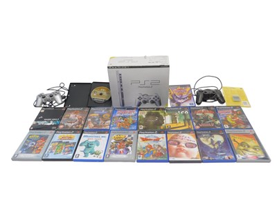 Lot 529 - A PlayStation 2 in satin silver, boxed,...