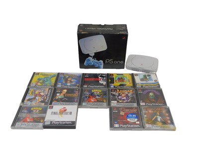 Lot 530 - A Sony PS1 PlayStation, SCPH-102B, boxed, and...