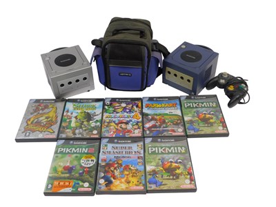 Lot 534 - A Nintendo Gamecube, unboxed, a silver...