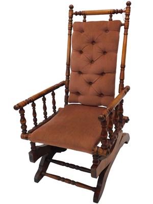 Lot 1240a - A late 19thC American walnut rocking chair,...