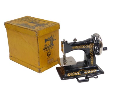 Lot 557 - A Bing of Bavaria child's sewing machine, in...