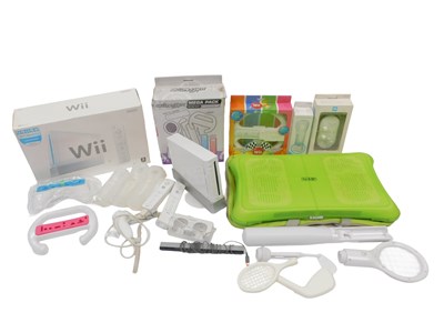Lot 596 - A Nintendo Wii and accessories, including Wii...