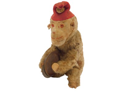 Lot 608 - A Max Carl clockwork toy monkey with cymbals.