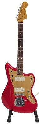 Lot 23 - A Fender Jazz Master red electric guitar, with...