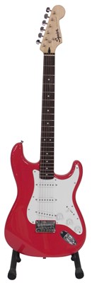Lot 39 - A Squier Stratocaster Coral Red electric...
