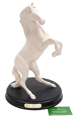 Lot 30 - A Royal Doulton white bisque figure of a horse,...