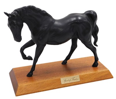 Lot 36 - A Royal Doulton black bisque figure of a horse,...