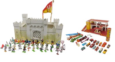 Lot 716 - A wooden play fort, a wooden garage, playworn...