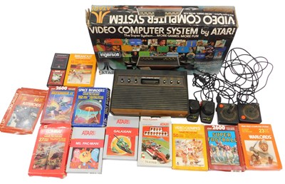 Lot 733 - An Atari video computer system, CX2600, boxed,...