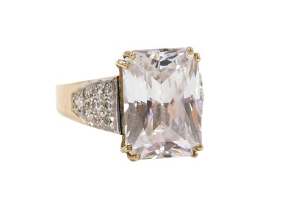 Lot 523 - A 9ct gold and cz ring, the rectangular...
