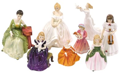 Lot 64 - Eight Royal Doulton porcelain figures,...