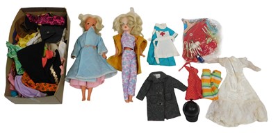Lot 760 - Two Sindy dolls, clothes and...