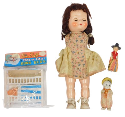 Lot 663 - A Pedigree doll missing arms, twin dolls in...