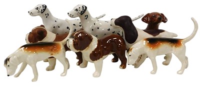 Lot 140 - A group of Beswick pottery figures of dogs,...