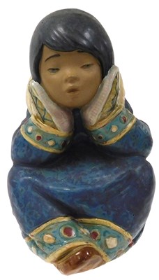 Lot 148 - A Lladro matte pottery figure of a Pensive...