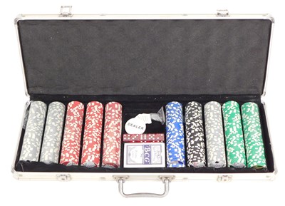 Lot 158 - A poker set, with chips, playing cards, and...