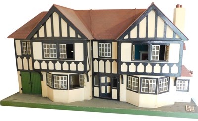 Lot 658 - A Tri-ang Tudor style doll's house.
