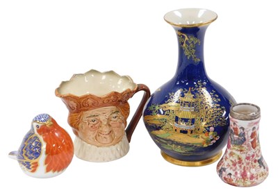Lot 245 - A Royal Crown Derby porcelain robin...