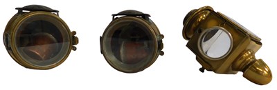 Lot 58 - Three brass car lanterns.