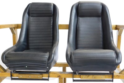 Lot 150 - Two Karobes leather bucket seats, attached to...