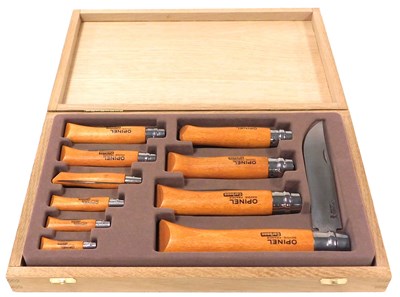 Lot 280 - An Opinel Carbone ten piece folding knife set,...