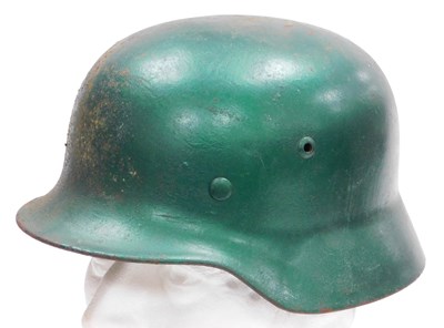 Lot 285 - A WWII German M40 Normandy camouflaged helmet.
