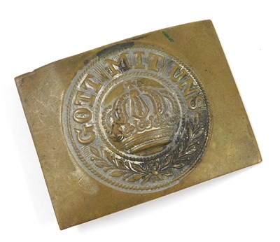 Lot 297 - A WWI German Prussian brass belt buckle,...