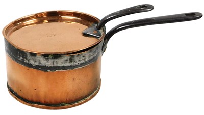 Lot 349 - A Victorian copper saucepan and lid, with cast...