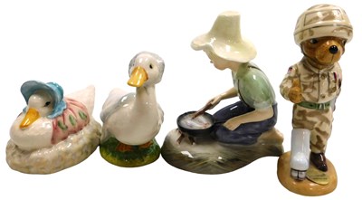 Lot 350 - A Royal Doulton figure modelled as River Boy...