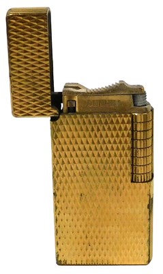 Lot 365 - A Dunhill gold plated pocket lighter, with...